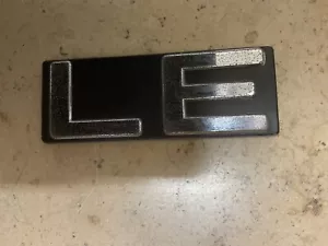 1984-1985-1986-1987-1988-1989 Toyota Van Wagon Rear Gate LE Emblem OEM - Picture 1 of 5