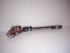 DCP FIRST GEAR 1/64 BRONZE KENWORTH W900L WITH 60" SLEEPER W/T D-EAGLE DROP DECK - Picture 1 of 11