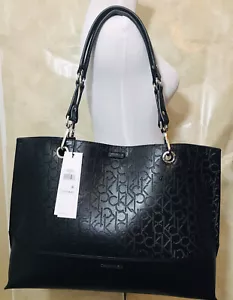 Borsa tote reversibile Calvin Klein nera e argento $168 con custodia e cinturino con cerniera - Foto 1 di 12