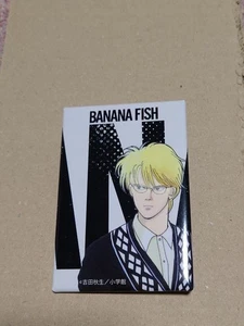 Bananenfisch Original zufälliges quadratisches Dosenabzeichen Asche - Bild 1 von 2