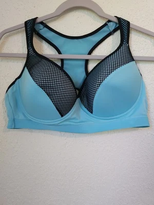 Sujetador deportivo verde azulado y negro talla 40C Foto 1 de 4