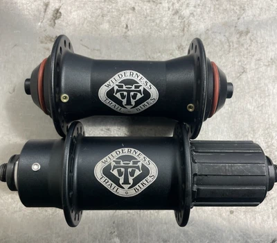 Juego de bujes WTB Momentum MTB negro 28H delantero 32H trasero protector de grasa no disco retro Foto 1 de 3