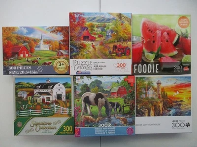 Box Lot of Six 300 Piece Puzzles:Buffalo, Ceaco, M. Pieces, RoseArt, Goliath,CPC - Image 1 of 4