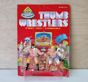 The Champion Thumb Wrestlers anni 80 Hulk Hogan Rick Rude vinile morbido WWF KO 62700 - Foto 1 di 6