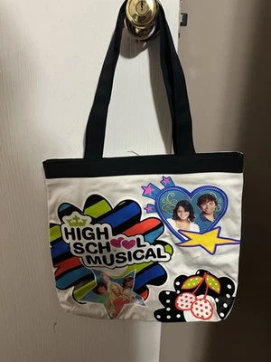 Bolso de hombro Disney Y2K High School Musical de lona de algodón fundido Foto 1 de 4