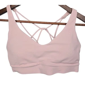 Reggiseno sportivo imbottito Athleta con spalline incrociate e schiena taglia small rosa - Foto 1 di 7