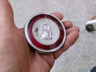 1951-1952 Plymouth Cranbrook Deluxe Horn Ring Emblem Ornament 1325171 NOS. - Image 1 of 3