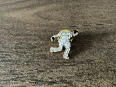 enamel pin badge depicting a male bowler in action - Image 1 of 2