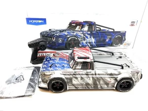 ARRMA Infraction V2 6S BLX Brushless 1:7 Scale RTR Electric 4WD Silver - Photo 1/15