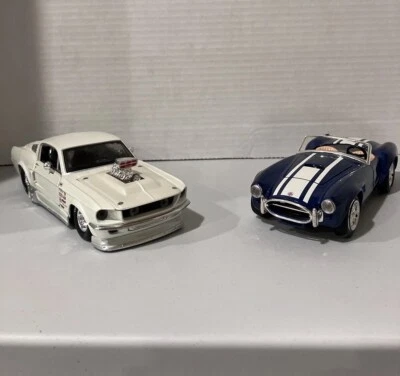 Bburago Shelby Cobra 427 azul + Ford Mustang GT Pro Street 1967 - diecast 1:24 Foto 1 de 4