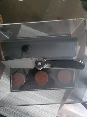 Chris Reeve Sebenza 31 grande - punto de caída derecho - incrustación Micarta negra - lengüeta plateada Foto 1 de 4