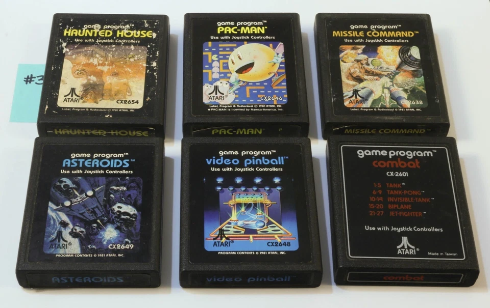 Atari 2600 Game Bundle Asteroids Pac-Man Missile Command Haunted House Pinball 3 - Image 1 of 1
