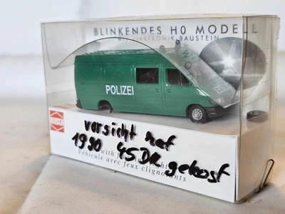 Busch - 5607 - H0 - MB Polizei Kastenwagen Blinkendes Modell 1:87 in OVP - Bild 1 von 4