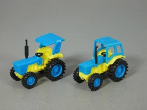 AUTOS: Traktoren EU 1988/90 - Komplettsatz hellblau/gelb - Bild 1 von 1