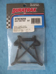 GENUINE DURATRAX 9254 SHOCK TOWER FRONT EVADER STADIUM TRUCK EVST DTXC9254 NIP - Picture 1 of 1