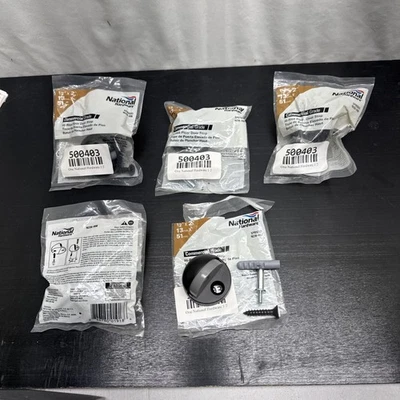 Juego de 5 topes de puerta de montaje en piso National Hardware SPB9202 N236-008 negro Foto 1 de 4