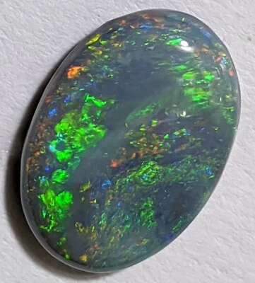 Galaxy! 4.5ct Semi Black Opal Green Orange Oval Lightning Ridge AU! - Image 1 of 4