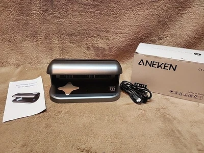 Detector de billetes falsos Aneken AL-17 con luz LED UV escáner de dinero Foto 1 de 4