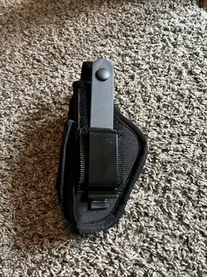 Uncle Mike’s GunMate Ambidextrous Hip Holster Size 6 With Magazine Pouch - Image 1 of 4