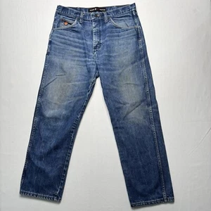 Pantalones de mezclilla Wrangler FR resistentes al fuego para hombre 33X30 azul FR31MWZ ropa de trabajo relajada - Imagen 1 de 9