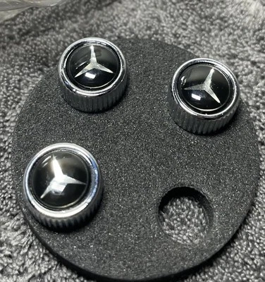 Tapa de vástago de válvula de neumático Mercedes Benz estrella negra sobre plata 3 tapas OEM Foto 1 de 3