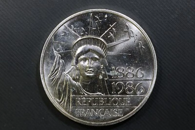FRANCIA 1986 ESTATUA DE LA LIBERTAD 10 FRANCOS .4340 ASW .900 FINA BU moneda en cápsula Foto 1 de 2