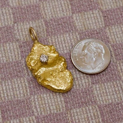 COLGANTE PEPITA DE DIAMANTE DE UN QUINTO QUILATE DE ORO AMARILLO DE 22-24K FRENTE A G Foto 1 de 4