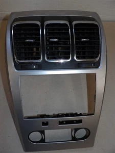 GMC ACADIA 2007-2012 TABLERO CENTRAL CLIMATIZACIÓN CALEFACCIÓN CONTROL RADIO ESTÉREO BISEL VENTILACIONES - Imagen 1 de 5