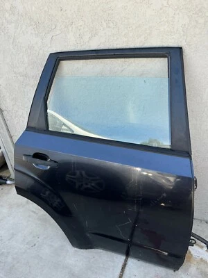 Conjunto de puerta trasera derecha Subaru Forester 2009-2013 2,5 L 4 cilindros OEM Foto 1 de 4