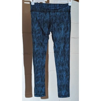 Leggings deportivos Kirkland Signature azules negros estampados pequeños de entrenamiento Foto 1 de 3