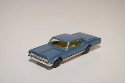 A56 1:64 HUSKY OLDSMOBILE STARFIRE COUPE BLU METALLIZZATO QUASI COME NUOVO - Immagine 1 di 4