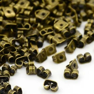 100 ANTIGUOS PENDIENTES DE BRONCE PERGAMINO MARIPOSA RESPALDO TAPONES AB22 - Imagen 1 de 2