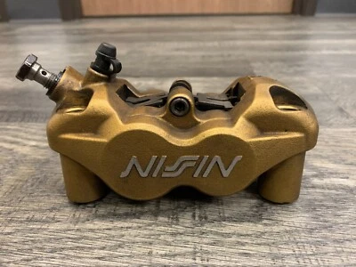 Pinza de freno delantera izquierda Triumph Daytona 675 Street Triple R OEM Nisin T2020357 Foto 1 de 4