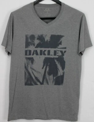 Camiseta OAKLEY Grande Unisex Manga Corta Cuello en V Gris Jaspeado con Estampado Gris Oscuro Foto 1 de 3
