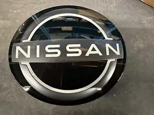 NEW OEM NISSAN ROGUE / ROGUE SPORT / KICKS FRONT GRILLE EMBLEM - UPDATED STYLE - Picture 1 of 3