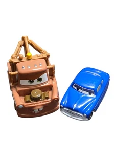 Disney Pixar Cars Filme 2 Stück Mater Rusty Tow Truck & Doc Hudson Energizer  - Bild 1 von 24