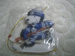 Toronto Maple Leafs Snoopy Playing Hockey Peanuts Christmas ornament Acrylic - Picture 1 of 2