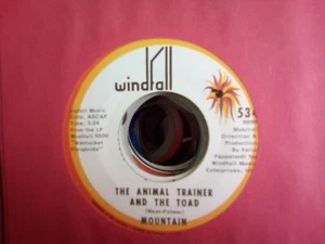 mountain the animal trainer and the toad - Picture 1 of 1