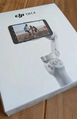 DJI OM 4 SE 3-Axis Smartphone Gimbal Stabilizer with Tripod - Grey - Image 1 of 3