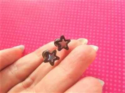 Tachuelas de enchufe falsas estrella de madera Foto 1 de 2