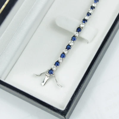 White Gold Finish Created Diamond Blue Sapphire Round Cut Tennis Bracelet - Image 1 of 4