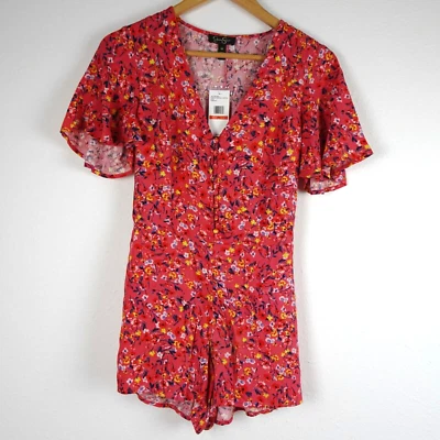 Mameluco Jessica Simpson para mujer talla XS naranja estampado floral manga acampanada Foto 1 de 4