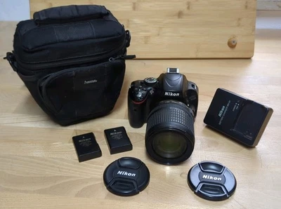 Nikon D5100 DSLR + AF-S DX NIKKOR 18–105mm VR + Zubehörpaket - Bild 1 von 4
