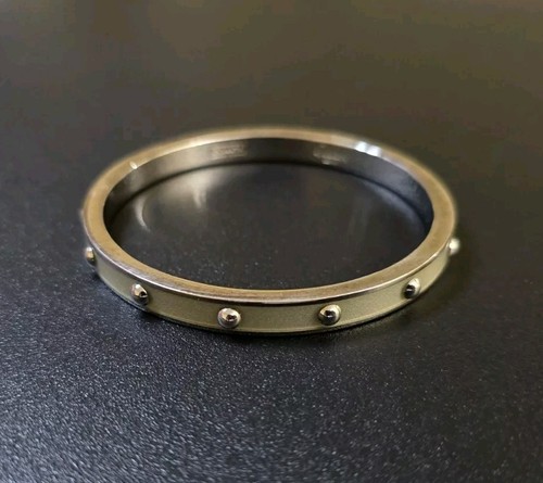 Bracciale Coach con borchie smaltate