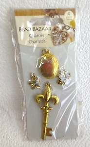 Bead Bazaar 4 Piece Gold Charms Key Locket Flower Bow - Picture 1 of 3