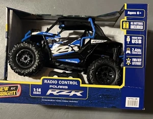 NEW BRIGHT RC 1:14 *POLARIS RZR 2.4 GHZ USB, BLUE *Batteries Included* - Picture 1 of 2