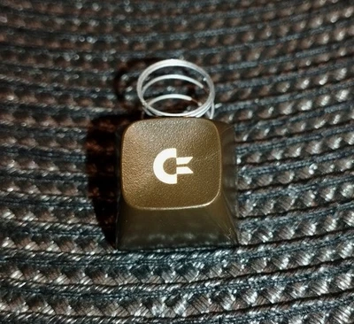Commodore Logo C64 Replacement Dark Brown Keyboard Key Cap with spring - Image 1 of 3
