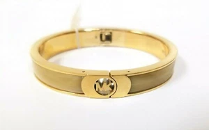 NEW MICHAEL KORS GOLD TONE FULTON LOGO HORN ENAMEL HINGE BANGLE BRACELET-MKJ3527 - Picture 1 of 4