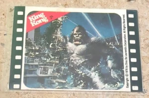 1976 Topps King Kong Sticker Sticker #2A Kong In The City Destroying Ship - Picture 1 of 5