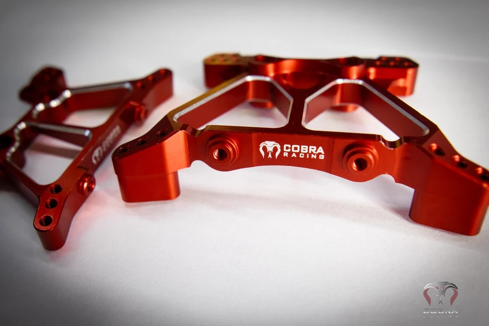 CR Red Aluminum Shock Towers for Traxxas 4x4 Slash, Stampede, Hoss - Image 1 of 4